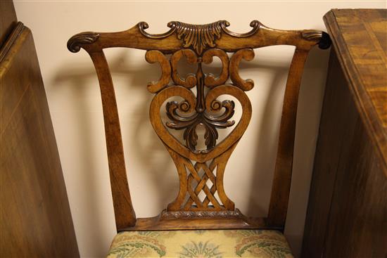 A pair of George III Chippendale style walnut dining chairs,